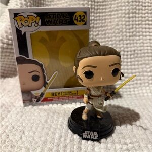 Pop Star Wars Rey Vinyl Figure with Yellow Lightsaber